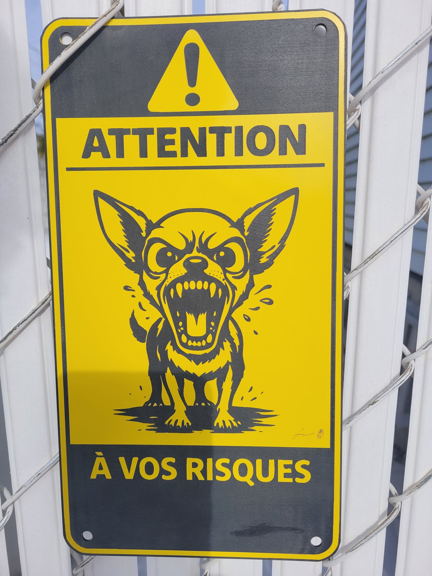 Panneau “Attention – À vos risques – Chihuahua